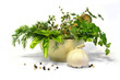 herbs and spices bunch in a bowl with a pestle