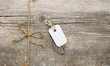 String tied in a bow and address label attached. With copy space