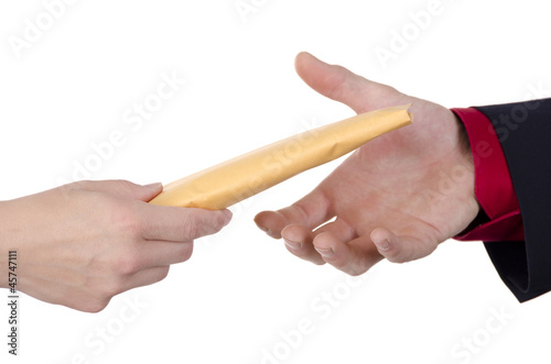 Photo: Giving and taking an envelope Giving and taking an envelope