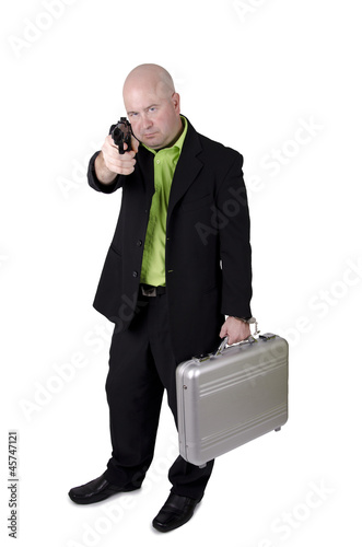 Photo: Man pointing gun Man pointing gun