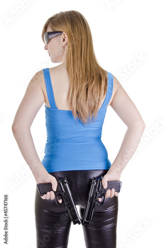 Photo: Young woman with guns Young woman with guns