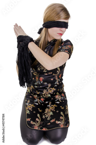 Photo: Woman hands tied up and blindfolded Woman hands tied up and blindfolded