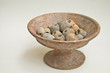 Clay tray and stone bead