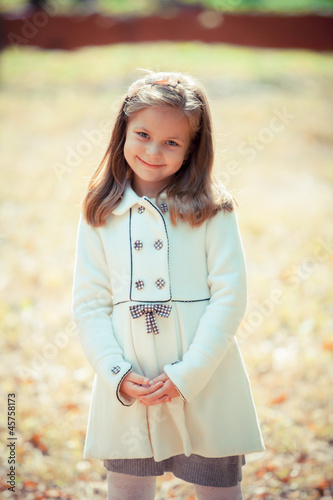 Photo: Portrait of a beautiful liitle girl close-up Portrait of a beautiful liitle girl close-up