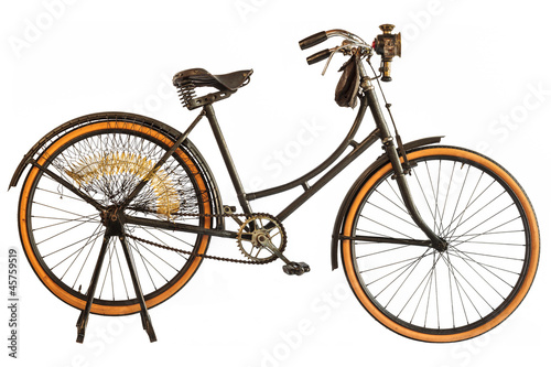 Photo: Vintage early twentieth century bicycle isolated on white Vintage early twentieth century bicycle isolated on white