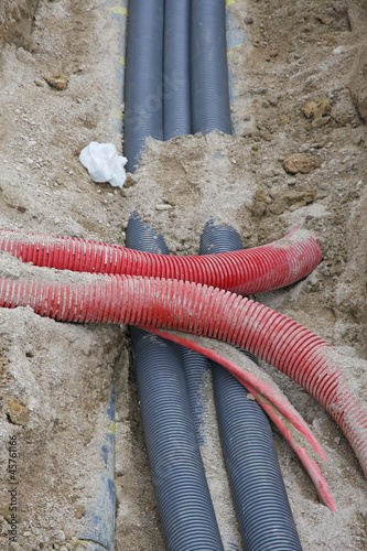 Photo: detail of an excavation at a construction site for the laying of detail of an excavation at a construction site for the laying of