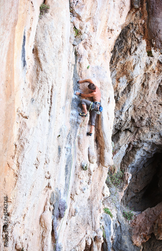 Photo: Rock climber on a cliff Rock climber on a cliff