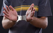 Man hands in handcuffs