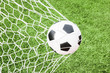 football in the goal net