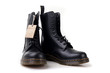 Black boots with craft lable on white background