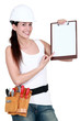 Female builder with a clipboard