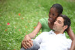 Couple lying in a meadow