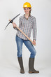 Woman posing with pick-ax