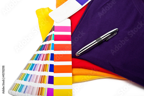 Photo: T shirts, color chart and pen T shirts, color chart and pen