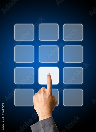 Photo: Hand pushing a botton Hand pushing a botton