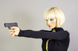 Photo: Blond sexy girl with gun Blond sexy girl with gun
