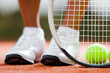 Legs Of Sportive Girl Near The...