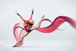 Young woman in gymnast suit posing