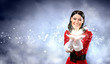 Portrait of girl wearing santa claus clothes