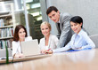 Business people discuss something at the meeting 