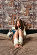 Girl sitting in bedroom and reading