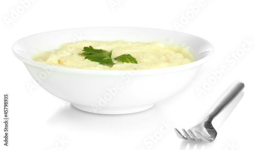 Photo: Mashed potato with parsley in the plate isolated on white Mashed potato with parsley in the plate isolated on white