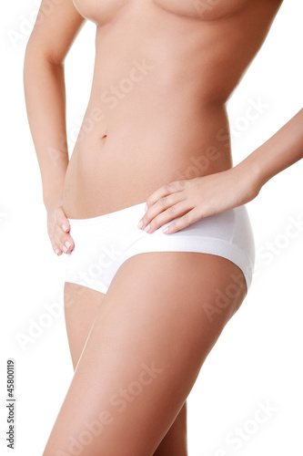 Photo: Fit woman body in white panties Fit woman body in white panties
