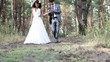 Married couple in pine forest