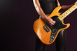 Playing an electric guitar
