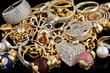 Foto: Gold jewelry on a black background Gold jewelry on a black background