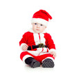 funny little kid in Santa claus clothes