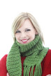 Smiling young woman in a winter scarf