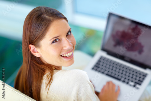 Photo: Browsing the web with a smile Browsing the web with a smile