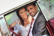 Photo: Bride and groom in a vintage car Bride and groom in a vintage car