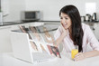 Girl chatting with friends on laptop