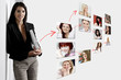 Professional woman holding laptop