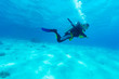 Silhouette of Scuba Diver near Sea Bottom