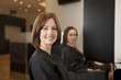 A female client showing off her new haircut