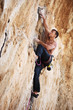 Rock climber on a cliff face