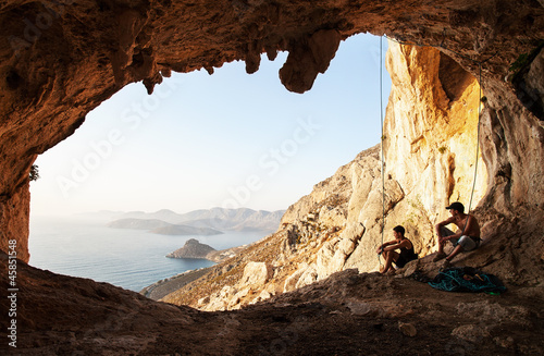 Photo: Two rock climbers having a rest. Kalymnos Island, Greece. Two rock climbers having a rest. Kalymnos Island, Greece.