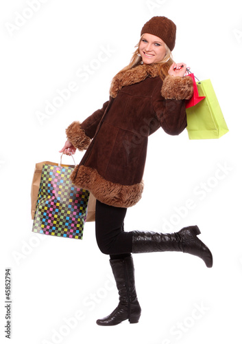 Photo: Happy woman with shopping bags. Happy woman with shopping bags.