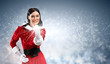 Portrait of girl wearing santa claus clothes