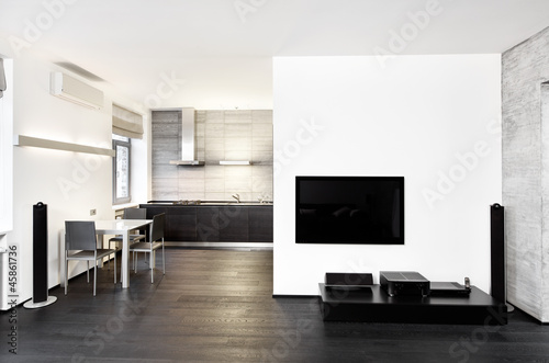 Photo: Modern minimalism style kitchen and drawing room interior Modern minimalism style kitchen and drawing room interior