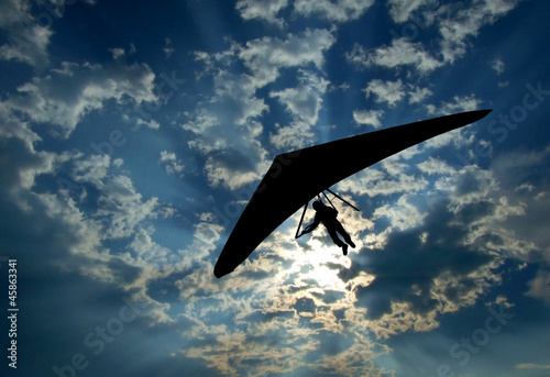 Photo: Hang glider silhouette on sky Hang glider silhouette on sky