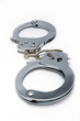Pair Of Handcuffs Isolated On White