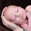 Photo: Cute little Newborn Baby boy posing for camera Cute little Newborn Baby boy posing for camera