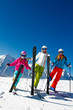 Skiing, winter fun - happy family ski team