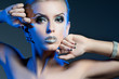 Luxury woman with rhinestones on her lips