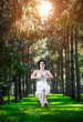 Yoga warrior pose in park