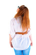 back view of standing redhaired woman